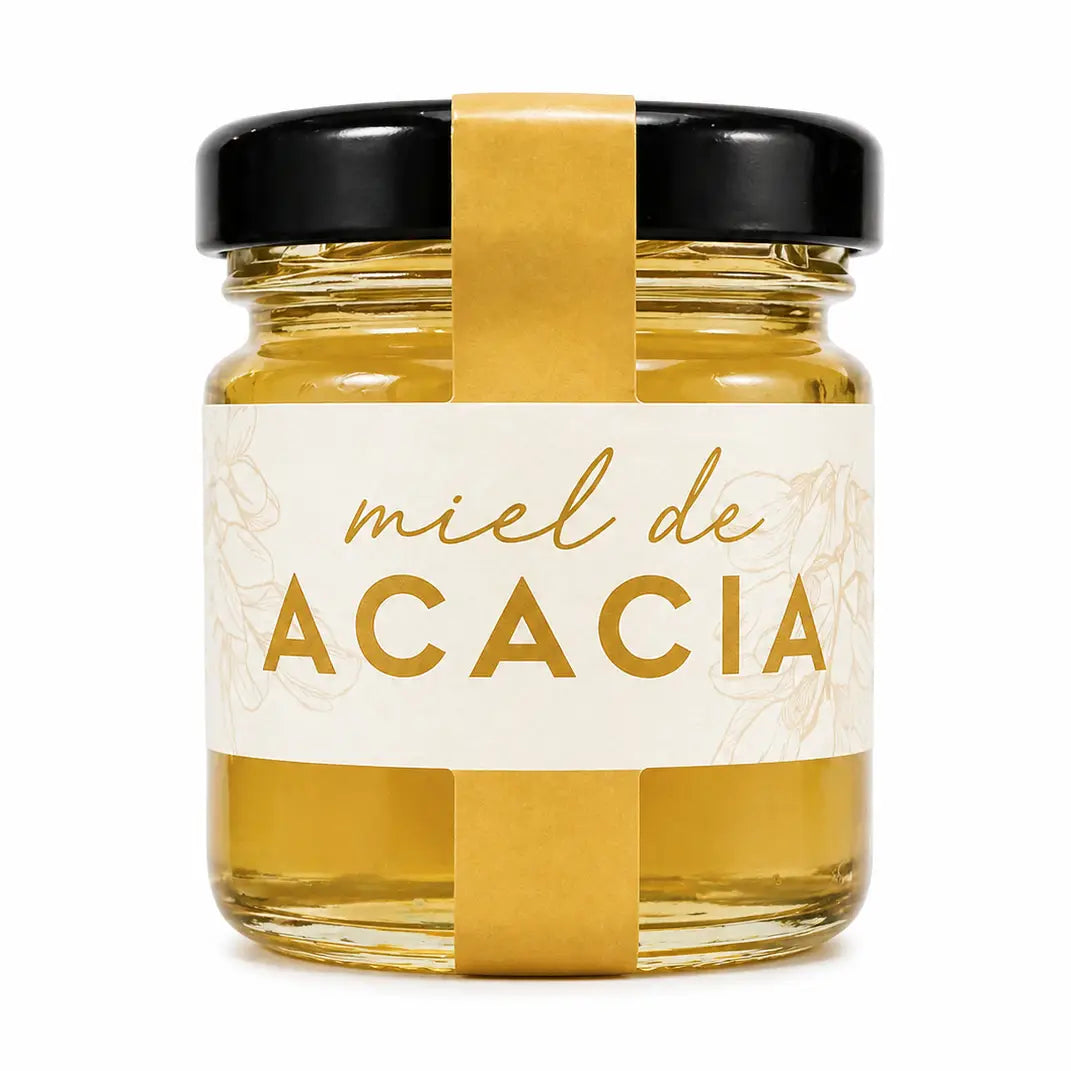 Frasco de Mel de Acácia de 50g com textura fina, tom âmbar claro transparente e produção artesanal