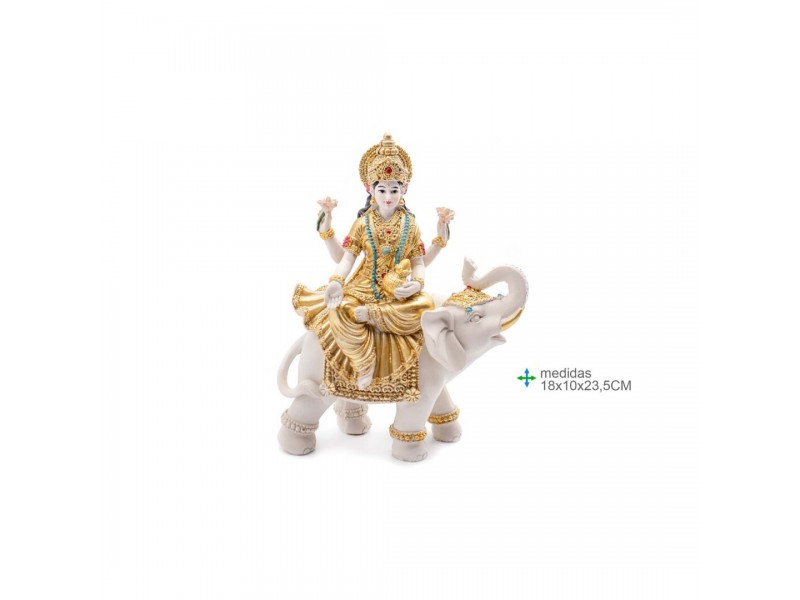 Estátua da deusa hindu Laksmy em manto dourado sentada sobre um elefante branco sagrado.