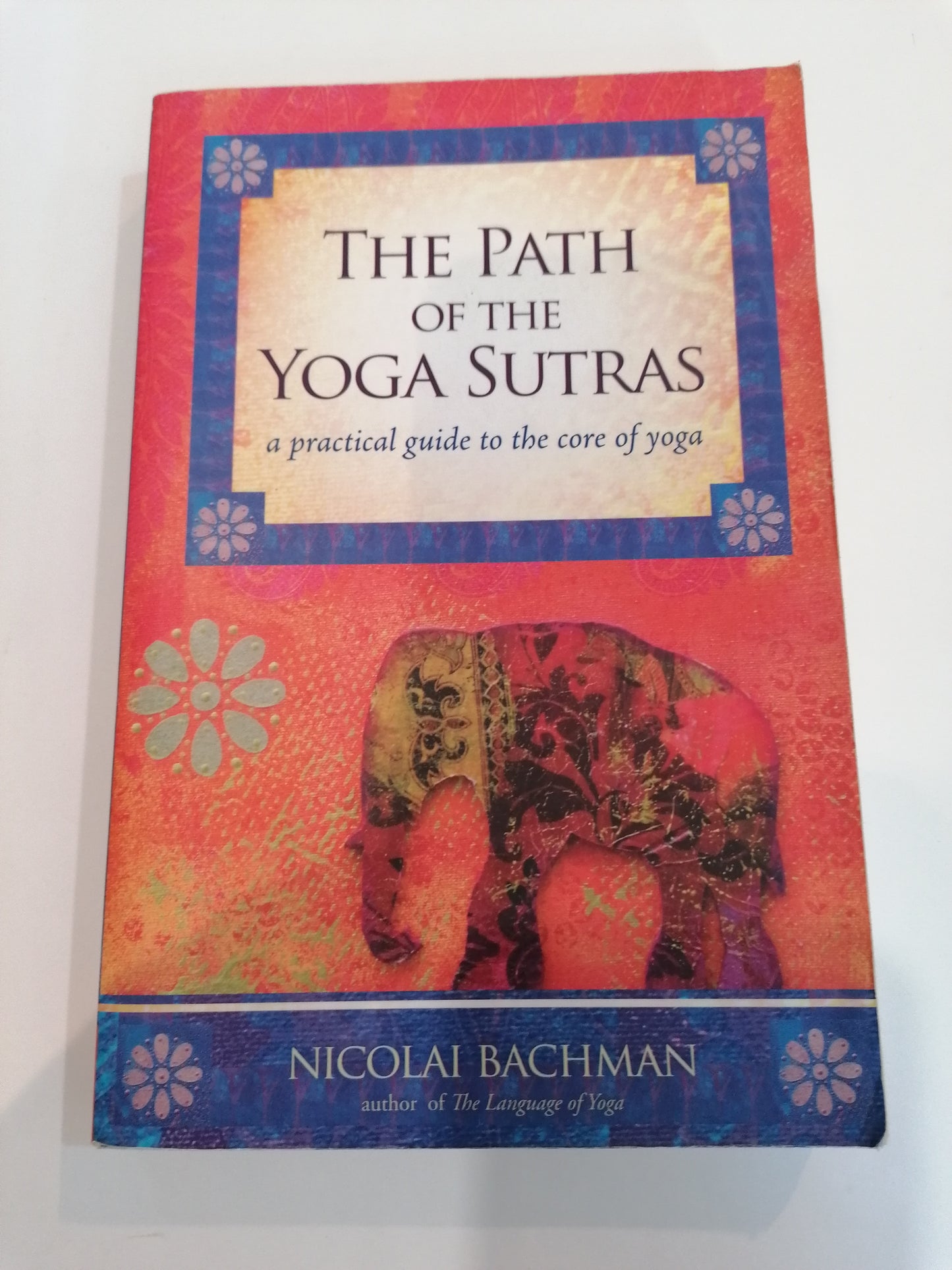Guia de Nicolai Bachman sobre os Sutras de Patanjali, capa com simbologia de yoga e filosofia.