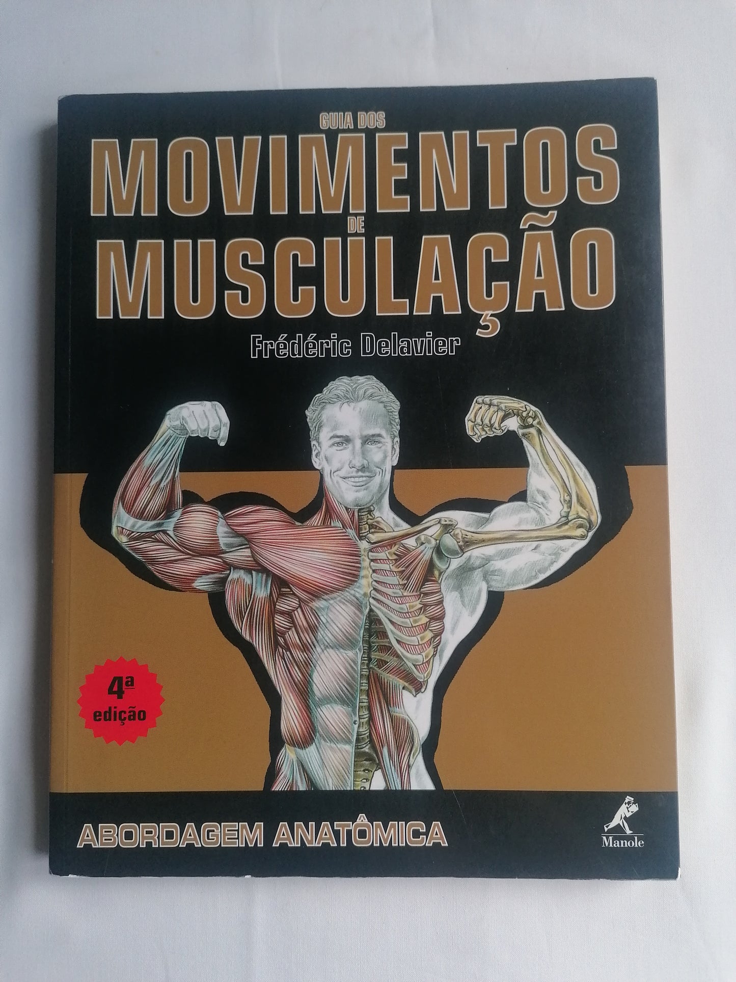Guia anatómico de Delavier, 4ª edição, mostrando detalhadamente o funcionamento muscular no treino.
