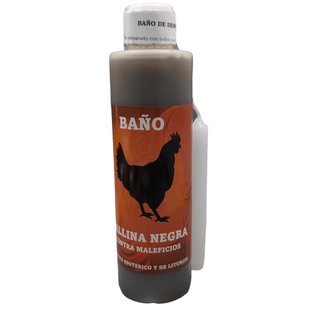Garrafa de Banho Liquido Galinha Negra ao lado de uma vela acesa e folheto explicativo para quebra de demanda e maleficios