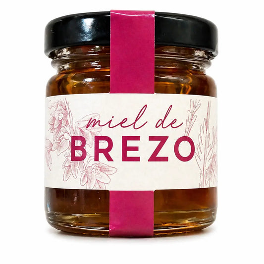 Frasco de Mel de Urze de 50g com tonalidade âmbar escuro e textura pura artesanal