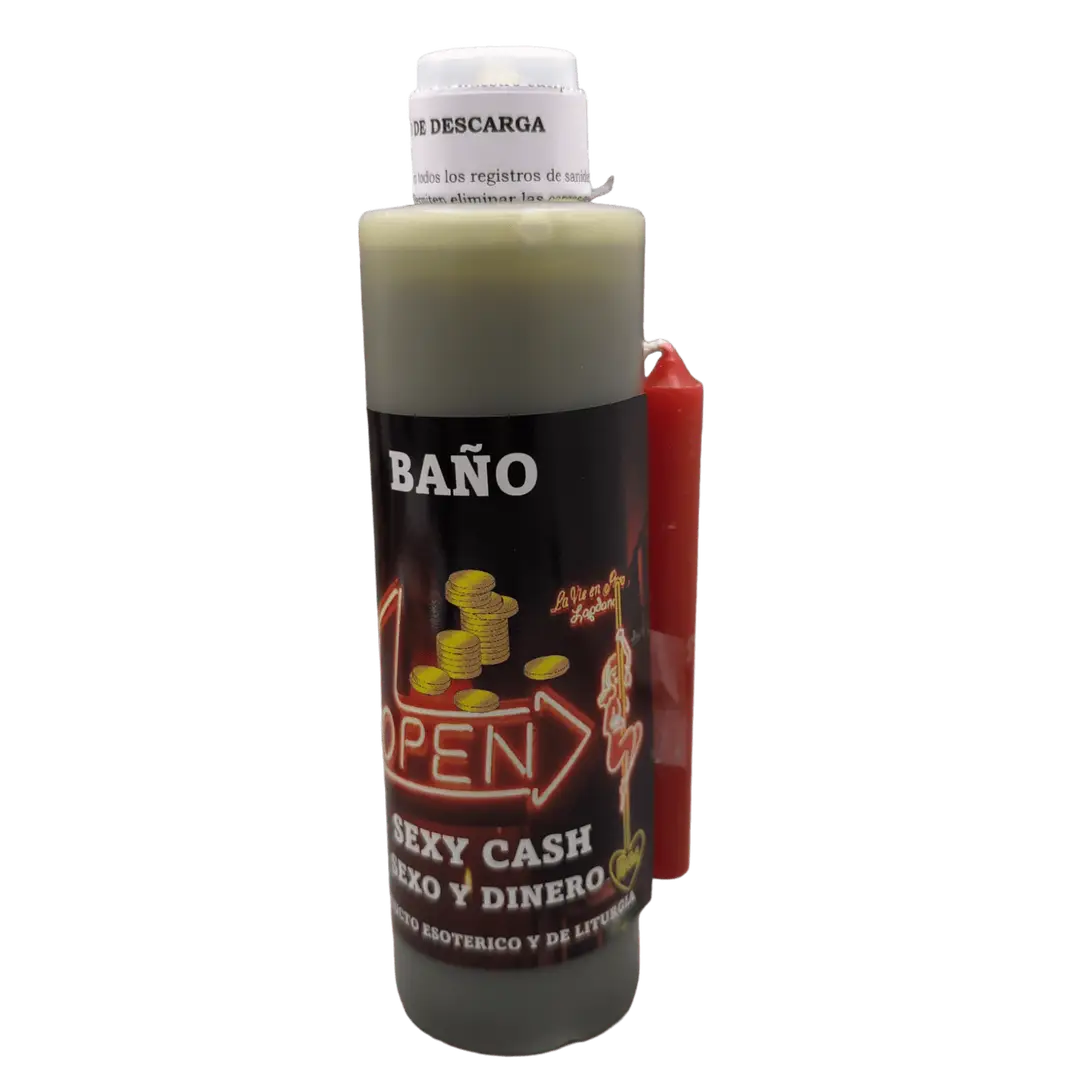 Garrafa de Banho Liquido Sexy Cash ao lado de uma vela acesa e folheto com instrucoes de uso para magnetismo e vendas