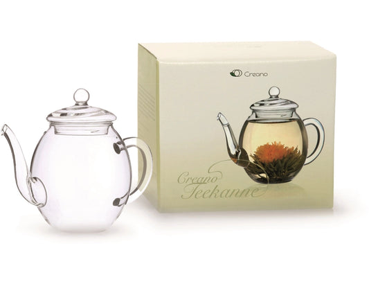 Bule de vidro transparente Creano com flor de cha a florescer no interior