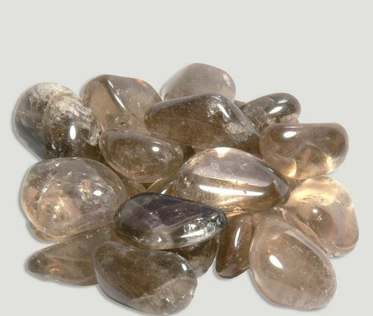 Pedra rolada de Quartzo Fumado com transparência acastanhada e tons fumados escuros (Morion)