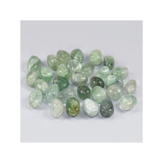 Pedra rolada de Fluorite Verde translúcida, ideal para limpeza energética e auxílio no estudo