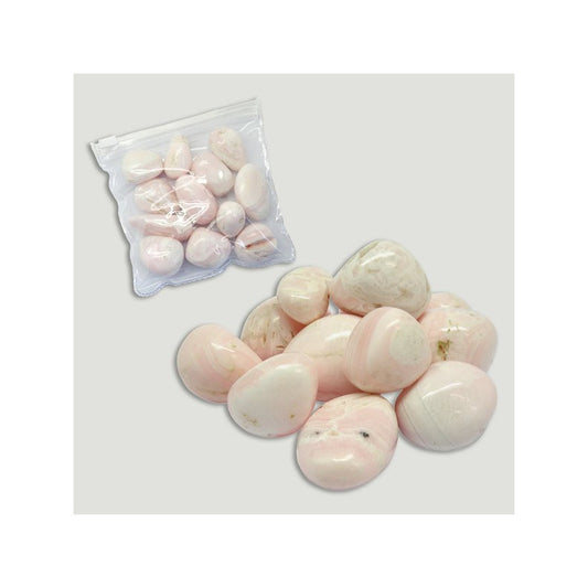 Pedra Manganocalcita polida de cor rosa pálido e textura opaca, ideal para decoração esotérica e cura energética